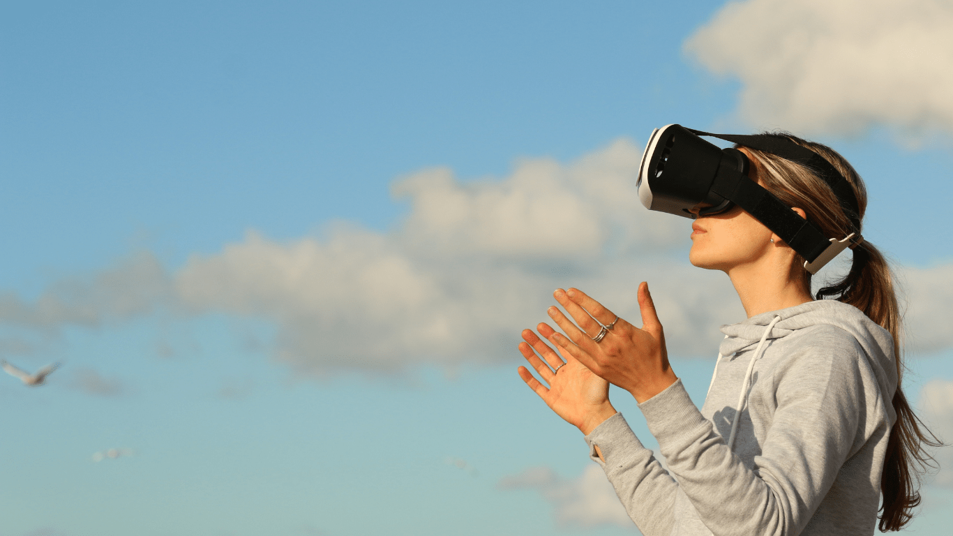 a woman wearing a vr goggles