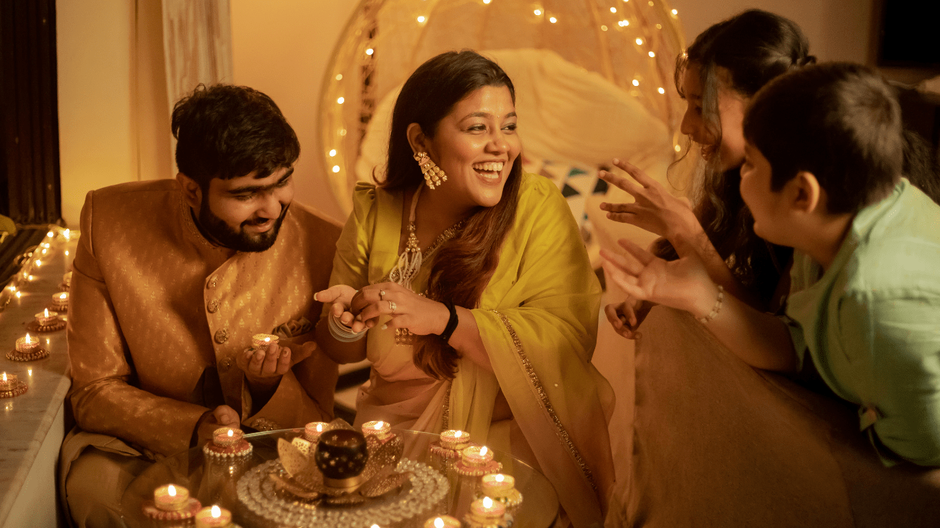 a group of people celebrating diwali