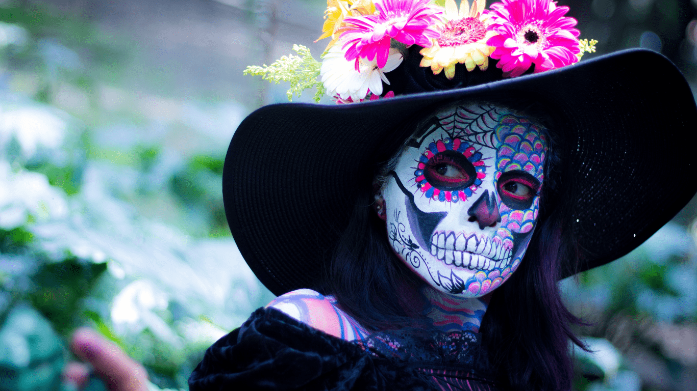 a woman wearing a skull make up