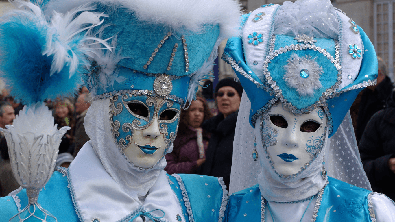 two pople wearing mascara in mardi gras