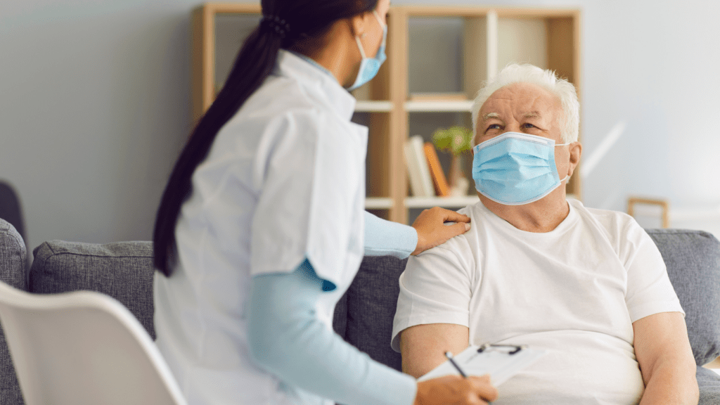 a healthcare worker checking up on a patient