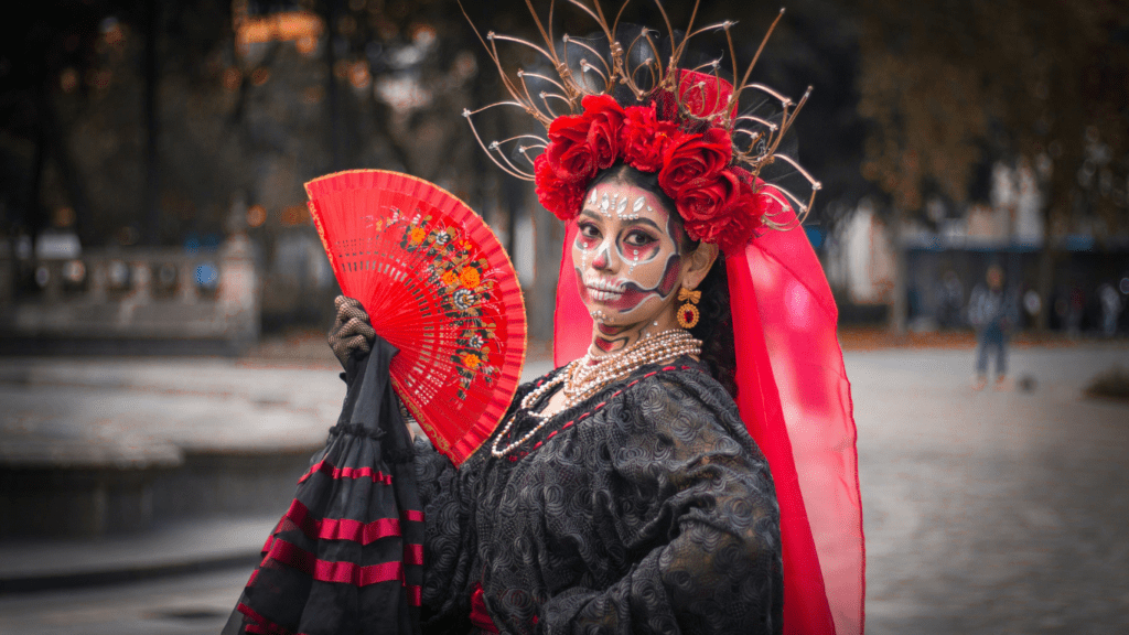 a woman portraying a calaveras and catrinas 